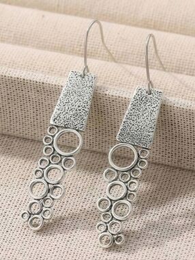 Boho abstract geometric silver earrings; 2"L x .4"H; nwot